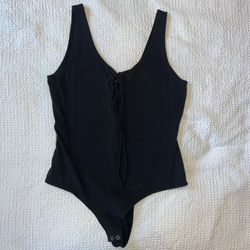 Black crisscross tie front bodysuit